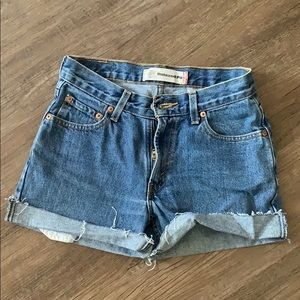Levi’s 550. Cut, cuffed shorts. Fit like 25 or 26